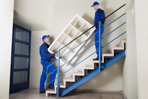 Worker following safe storage practices near shelving units